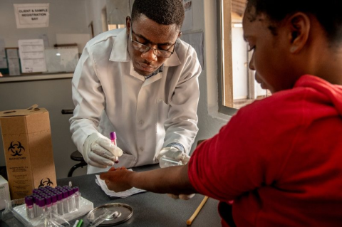 A man running a blood test.