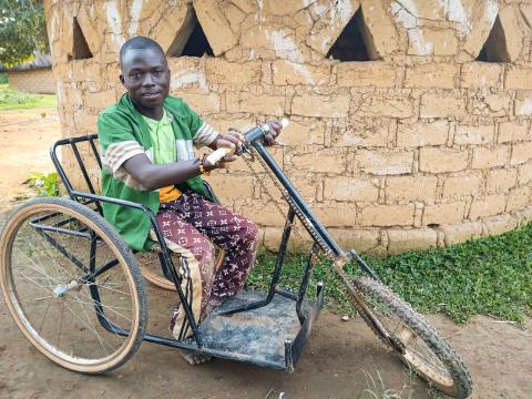 man sits in custom trike