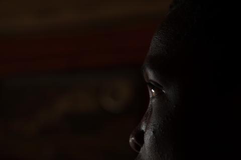 A child in the dark.