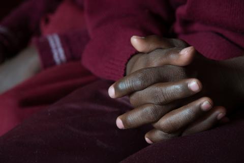 Hands of a child.
