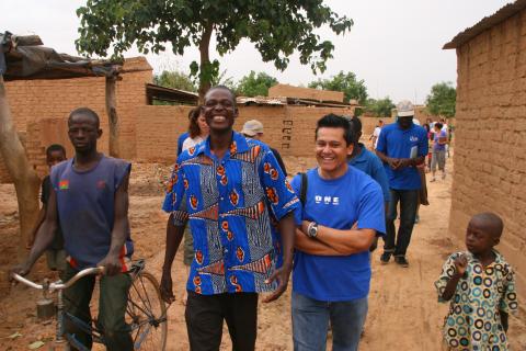 2 men walking and laughing