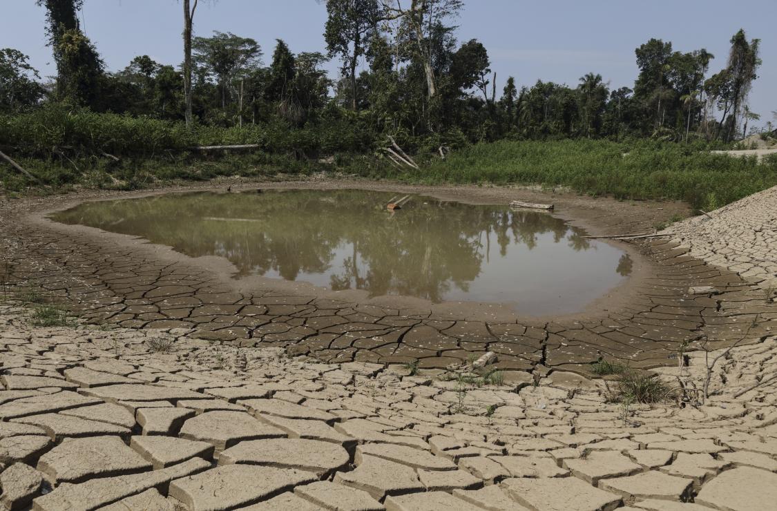 This is an abandoned mining site in Madre de Dios in the Peruvian Amazon. Once a forested area, this is what remains. Photo by Oscar Leiva/Silverlight for CRS