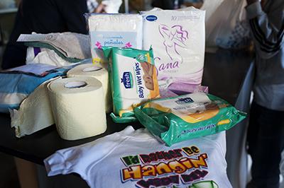 CRS and Caritas have organized distributions of bottled water and hygiene kits including soap, shampoo, sanitary supplies, toothbrushes, toothpaste, diapers and baby clothes. Photo by Kira Horvath for CRS