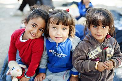 This year, conflicts, civil strife and economic conditions in the Middle East, Asia and Africa have dramatically increased the flow of refugees and migrants to Europe. Photo by Kira Horvath for CRS