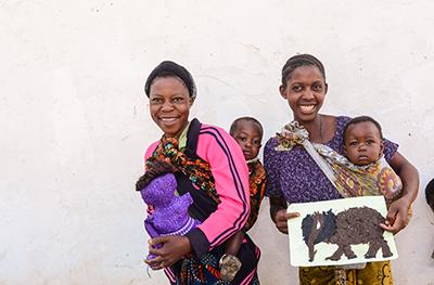 Toys stimulate young minds. THRIVE serves parents by showing them the importance of toys, and helping them create homemade toys. By the end of THRIVE, 77% of children were playing with locally made toys. Photo by Philip Laubner/CRS