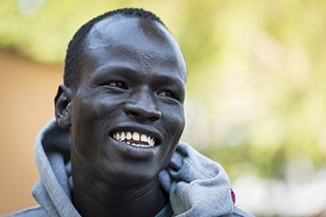 <b>Yiech Pur Biel<br />Sport:</b> Men’s Track and Field (800 m)<br /><b>Native Country:</b> South Sudan<br /><b>Host Country:</b> Kenya<br />Photo by IOC/Claire Thomas