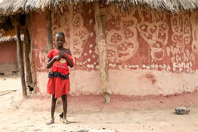 Girls can pay the heaviest price when there is drought. Often, they are pulled out of school to make money at home. Sometimes they are married off to whomever pays the highest dowry, income needed to help their families survive. Photo by Nancy McNally/CRS