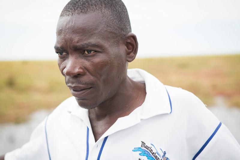 Edward Chikanga has been taking tourists out on Lake Kariba for the past six years. People like him depend on the lake and tourism to earn a living. Photo by Elie Gardner for CRS