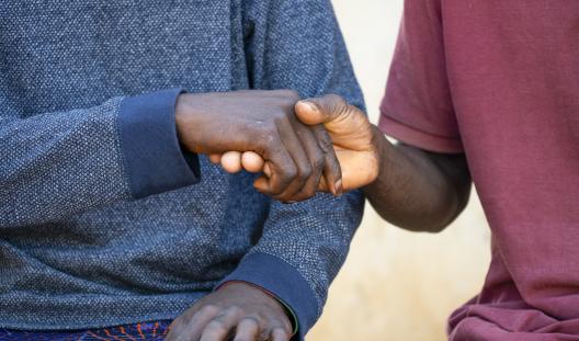 two men shaking hands