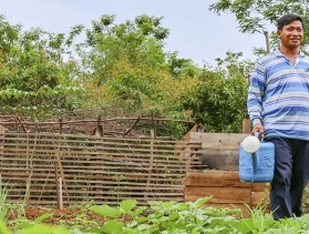 Cambodia couple in their garden