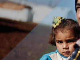 woman and child in migrant camp