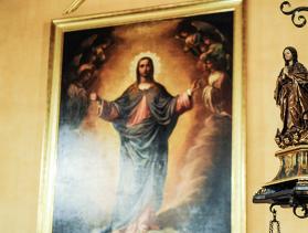 artwork of Jesus Christ hangs on wall