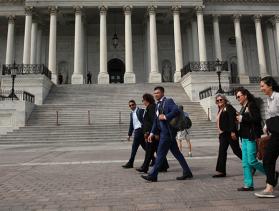 Advocates walking in front of the Capitol building