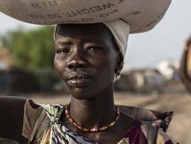 woman faces camera in South Sudan