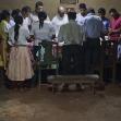 The Ramirez family prays in thanksgiving for God's provision.