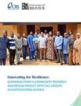 group of Nigerian people in front of tan building