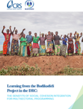 group of Congo citizens standing in a field waving arms