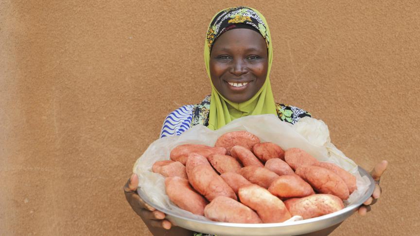 close portrait of smiling woman in Benin