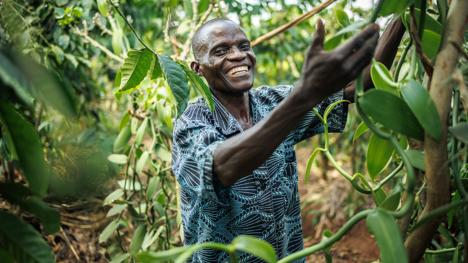 A man showing his harvest.