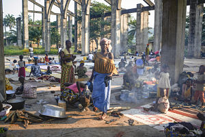 Thousands of people displaced by the violence are camping out at at a Catholic church under construction in the capital Bangui, exposed to the sun, the rain and the chilly December nights. Photo by Sam Phelps by CRS