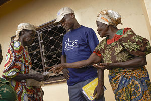 CRS, together with its partners, has distributed thousands of food vouchers in the town of Boda, Lobaye District, that can be exchanged for food from local vendors. Photo by Sam Phelps for CRS